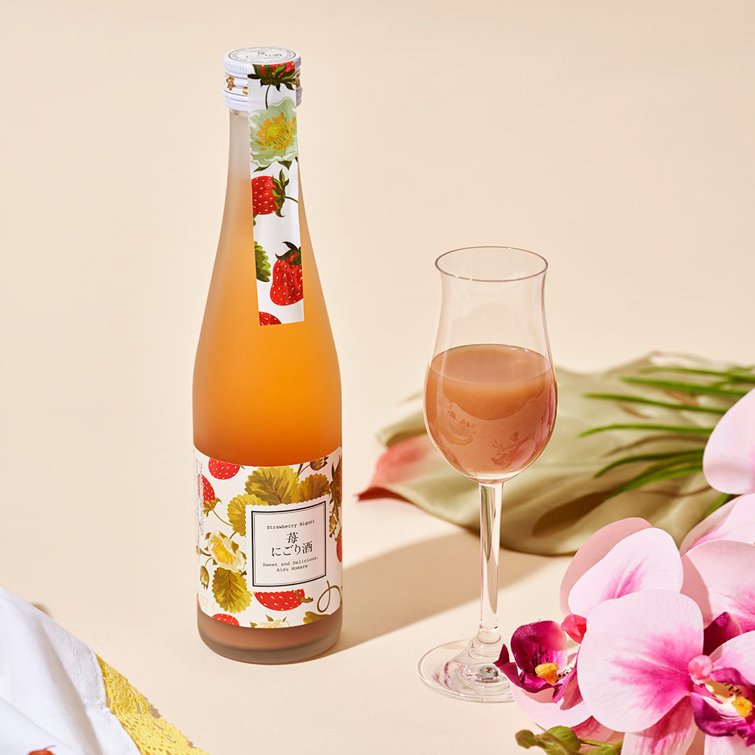 Homare “Strawberry” Nigori flavored nigori with a champagne flute