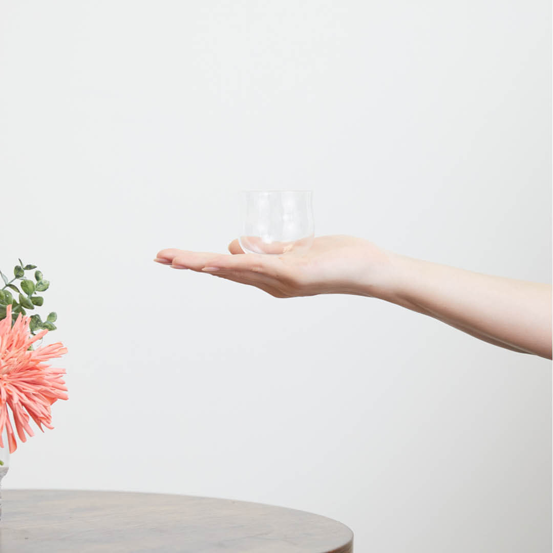 Ultra Thin Round Glass, on a hand